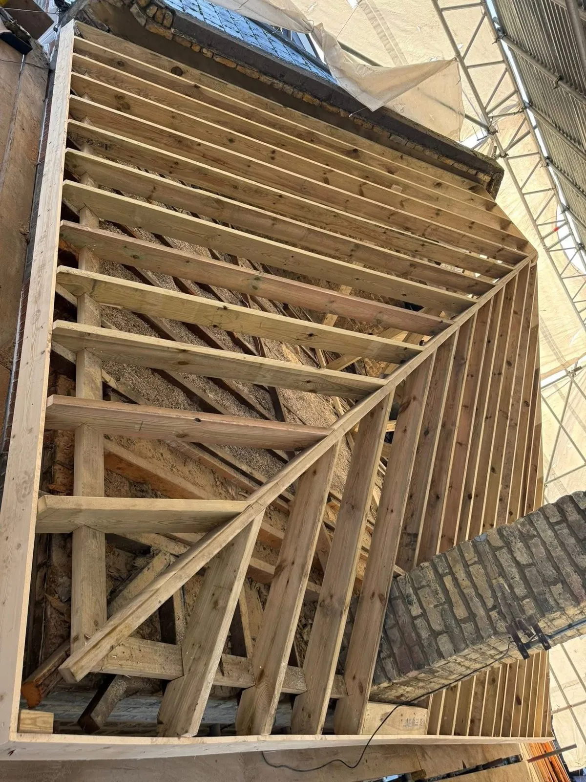 New roof timbers and rafters during a re-roof in Penzance